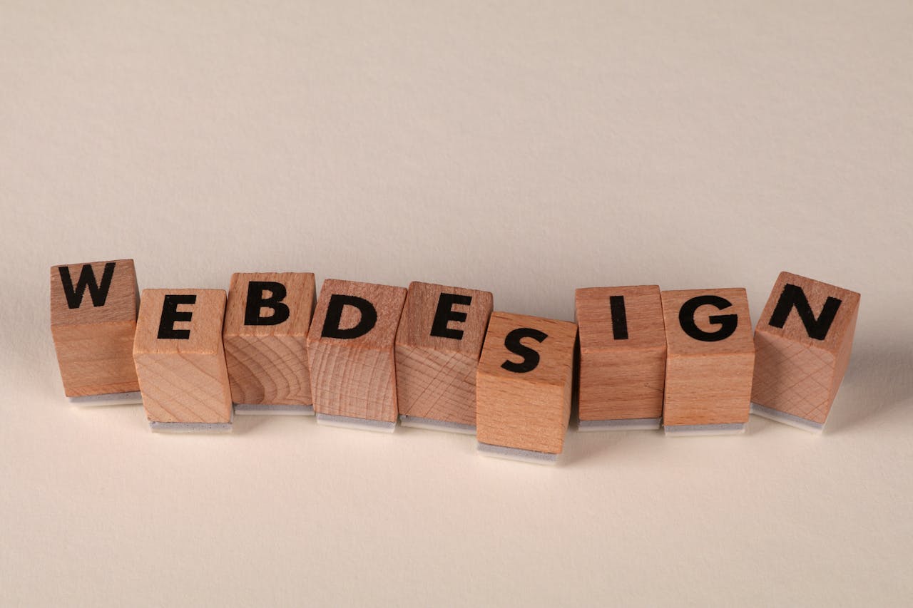 services-04 Wooden blocks spelling web design creatively showcase digital design concept.